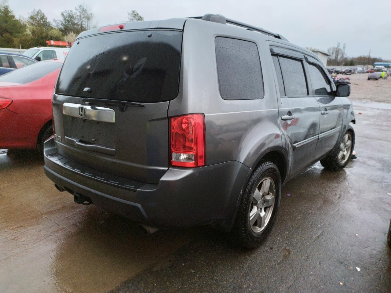 Photo 4 from auction – 2011 HONDA PILOT EXLN with VIN 5FNYF3H7XBB026372