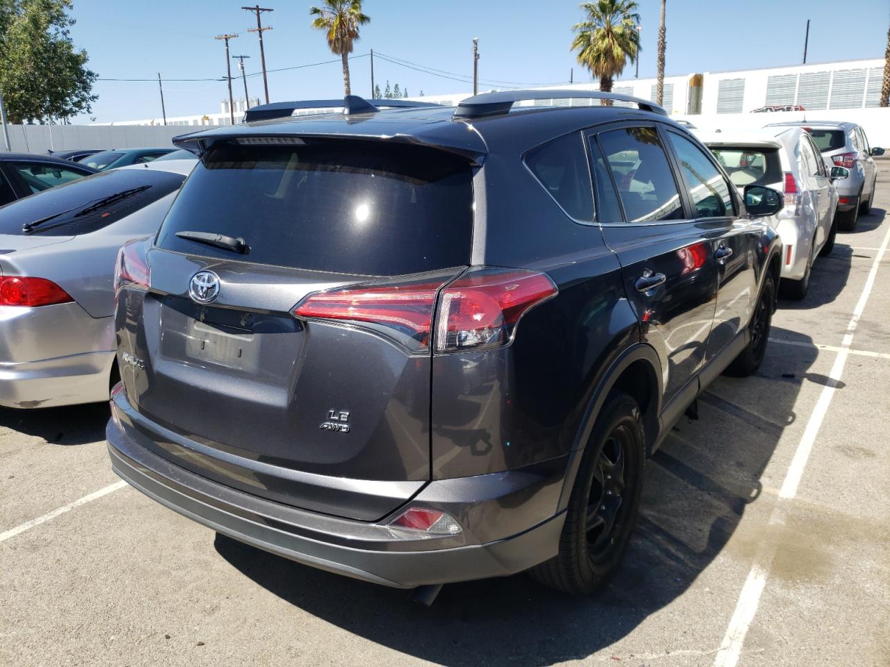 Photo 4 from auction – 2017 TOYOTA RAV4 LE with VIN 2T3BFREV5HW660266