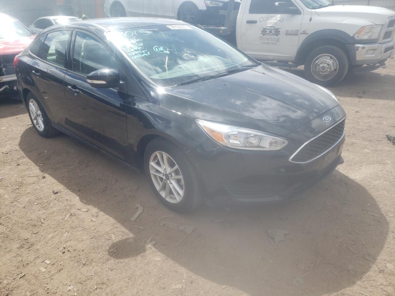 FORD FOCUS SE 2015 with VIN 1FADP3F26FL256289 - Photo from auction