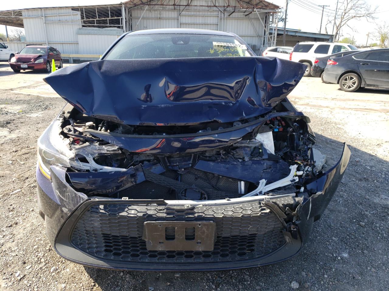 Photo 9 from auction – 2021 TOYOTA COROLLA LE with VIN JTDEAMDE0MJ008003