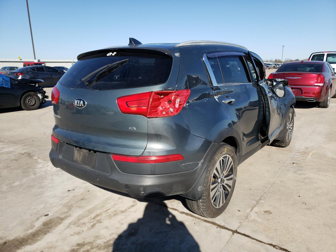 Photo 4 from auction – 2014 KIA SPORTAGE E with VIN KNDPCCAC9E7558332