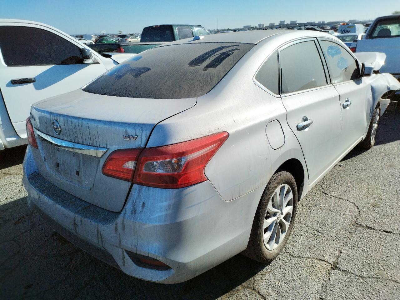 Photo 4 from auction – 2018 NISSAN SENTRA S with VIN 3N1AB7AP2JL642052