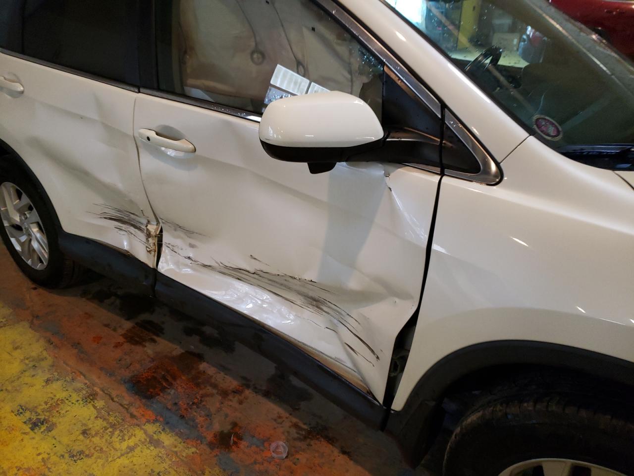 Photo 9 from auction – 2015 HONDA CR-V EXL with VIN 5J6RM4H78FL108873