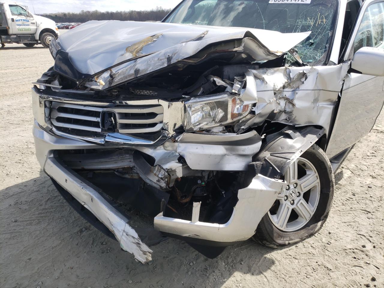 Photo 9 from auction – 2012 HONDA RIDGELINE with VIN 5FPYK1F55CB461195