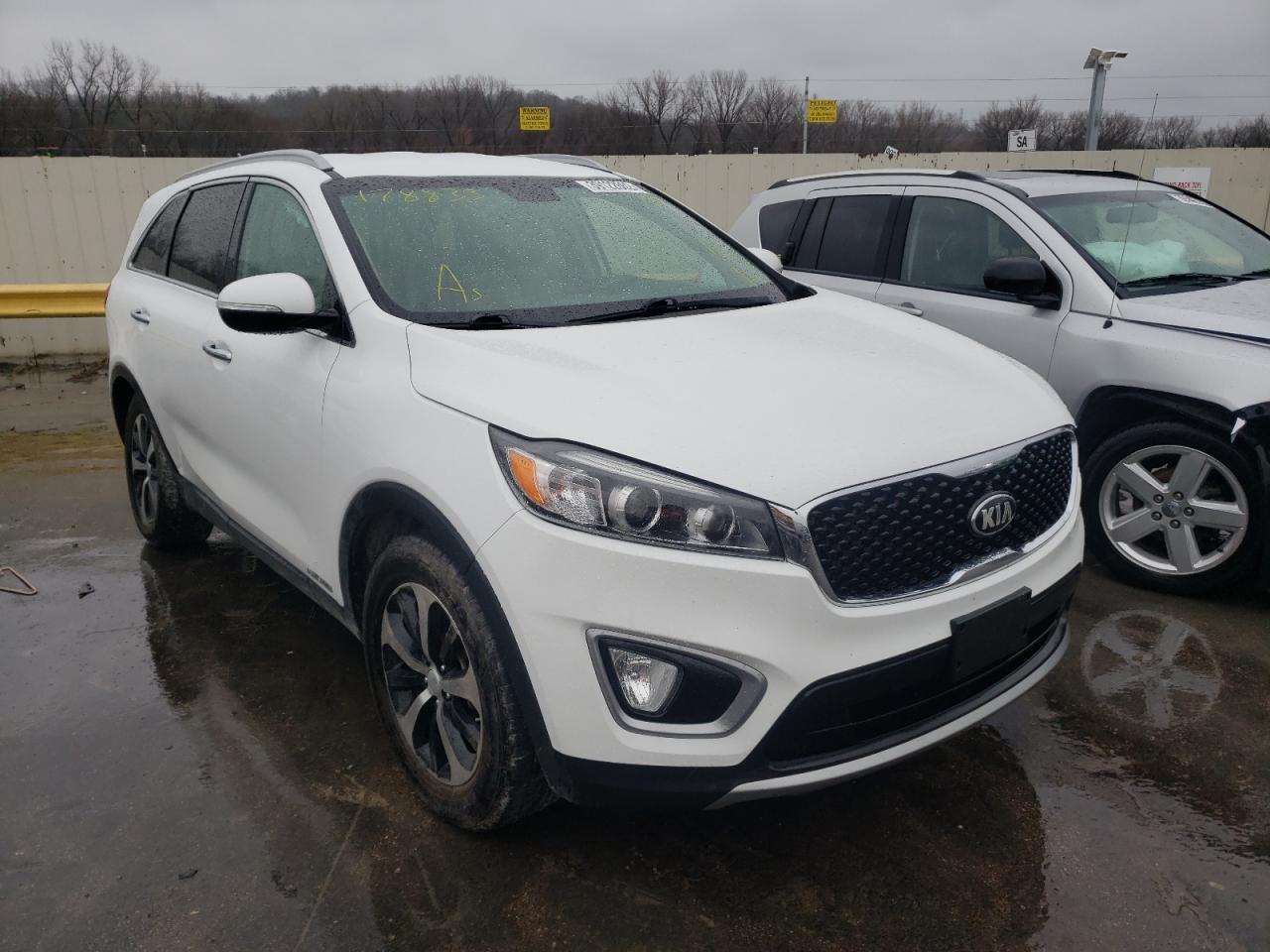 KIA SORENTO EX 2016 with VIN 5XYPHDA56GG178833 - Photo from auction