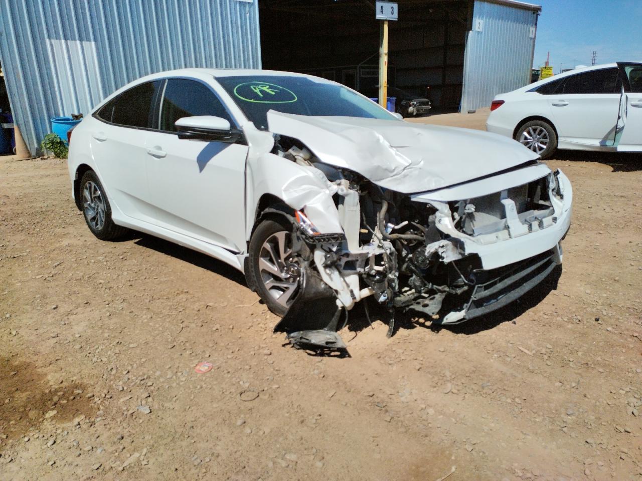 HONDA CIVIC EX 2017 con VIN 19XFC2F84HE075359 - Foto de la subasta