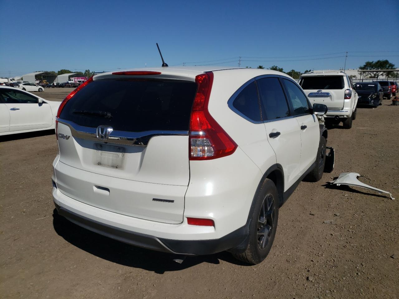 Photo 4 from auction – 2016 HONDA CR-V SE with VIN 5J6RM3H46GL012905
