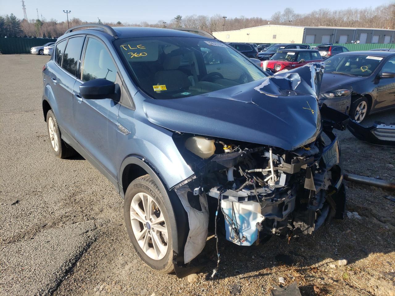 FORD ESCAPE SE 2018 with VIN 1FMCU9GD8JUB33285 - Photo from auction