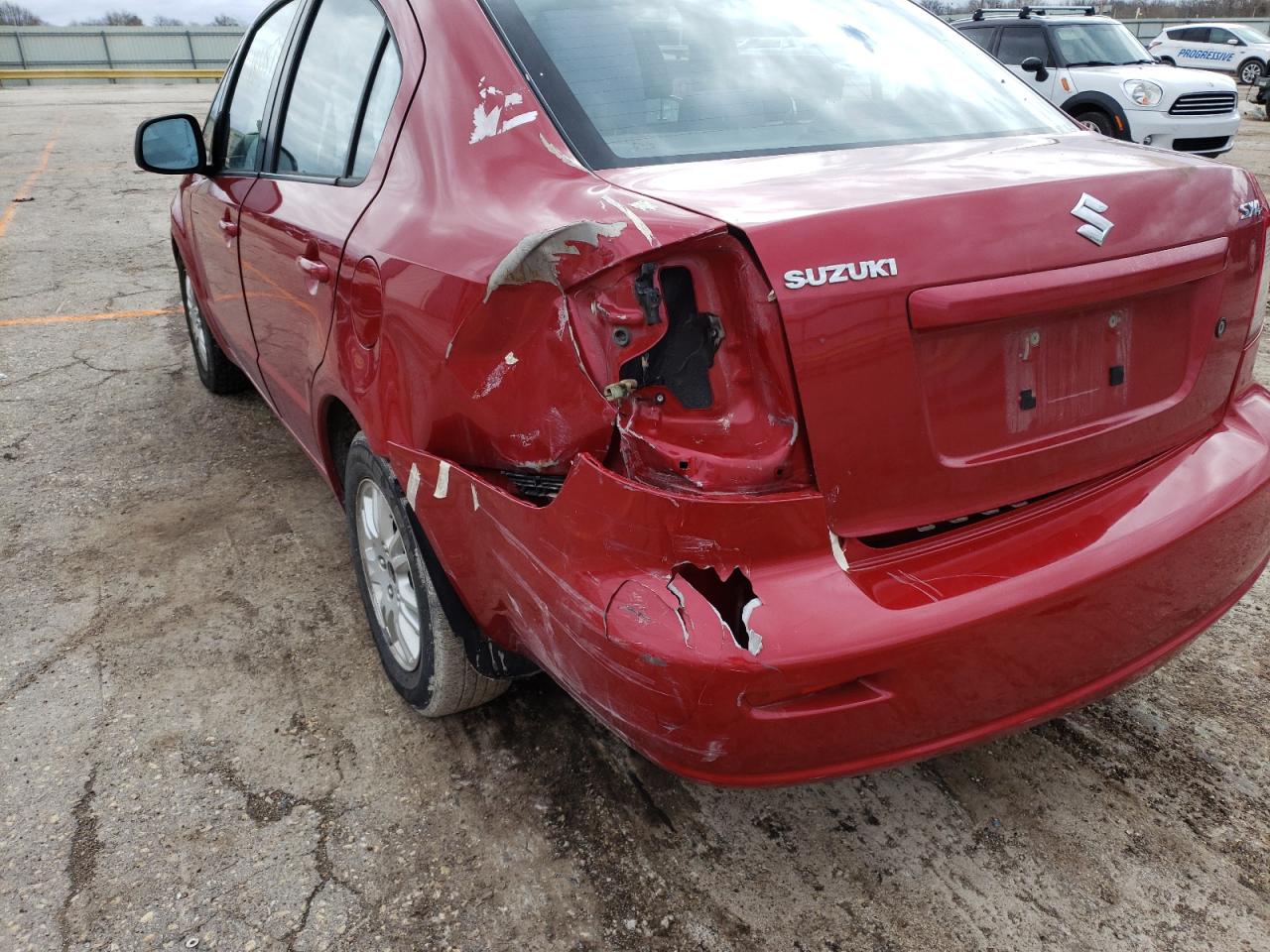 Photo 9 from auction – 2013 SUZUKI SX4 LE with VIN JS2YC5A37D6102288