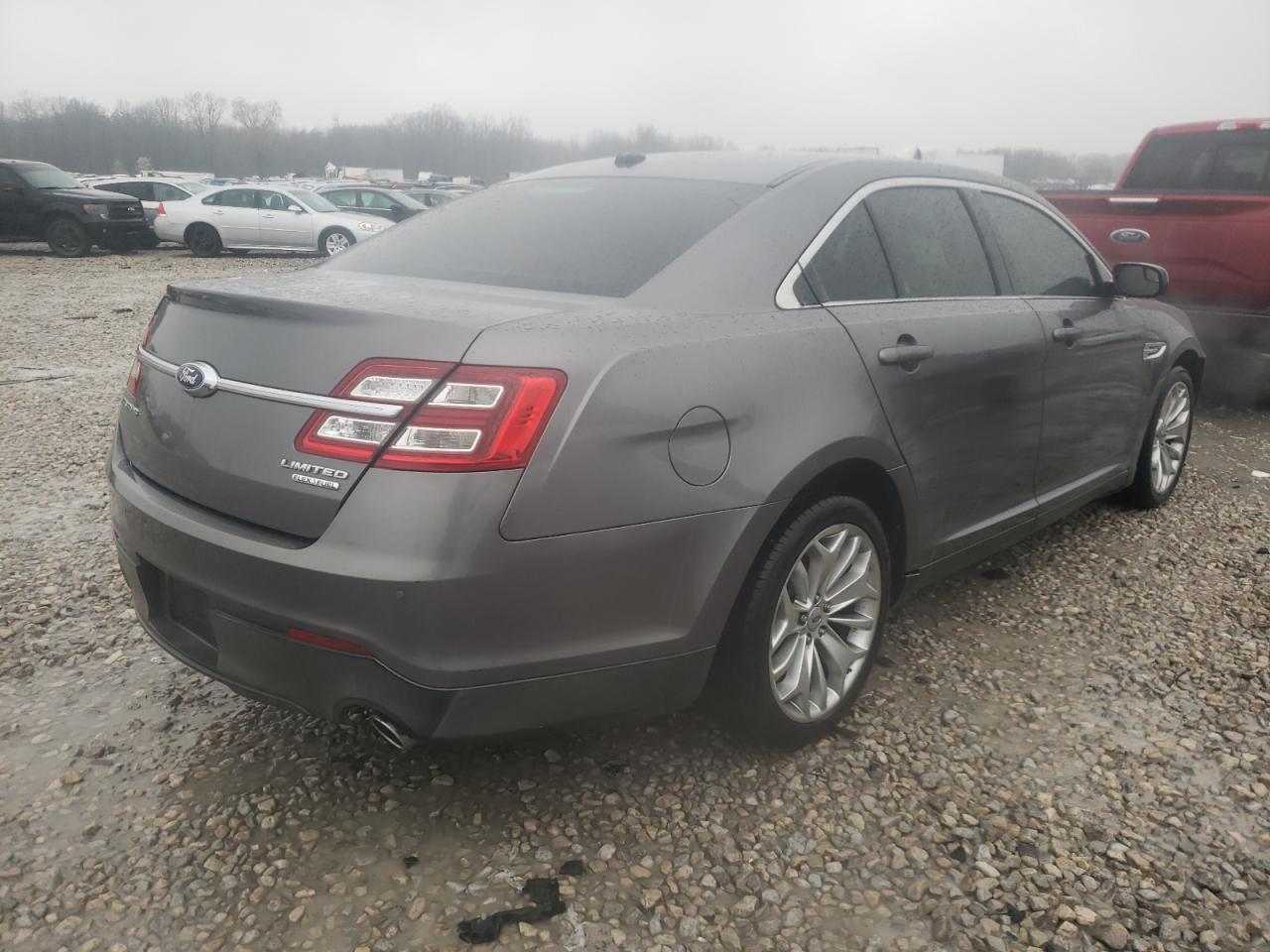 Photo 4 from auction – 2014 FORD TAURUS LIM with VIN 1FAHP2F87EG117960