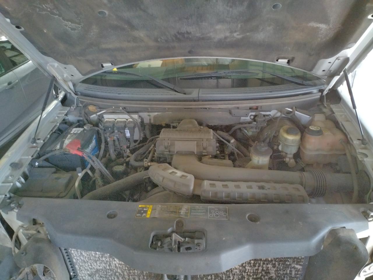 Photo 7 from auction – 2004 FORD F150 with VIN 1FTPX14534NA35789