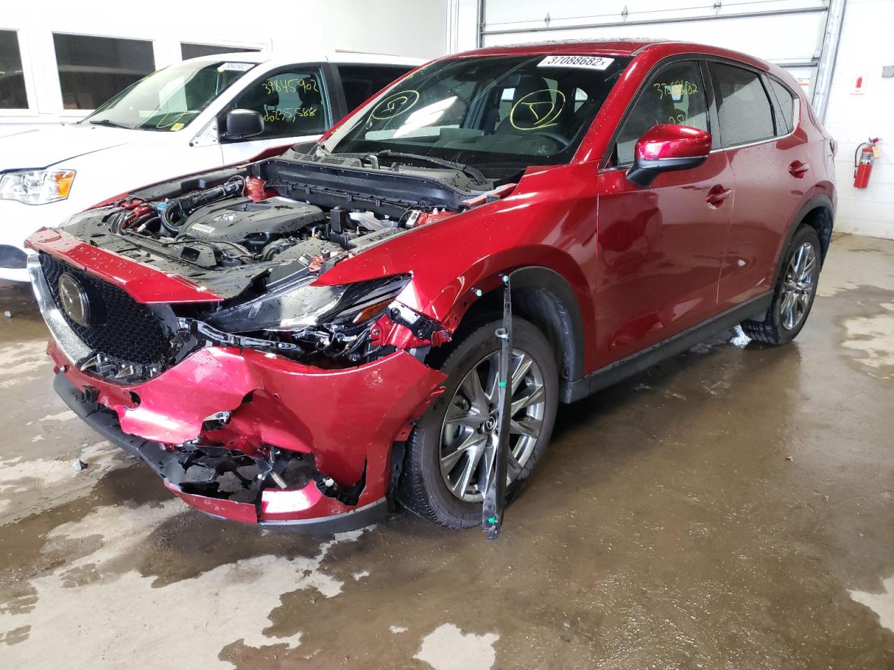 Photo 2 from auction – 2021 MAZDA CX-5 SIGNA with VIN JM3KFBEY0M0345530