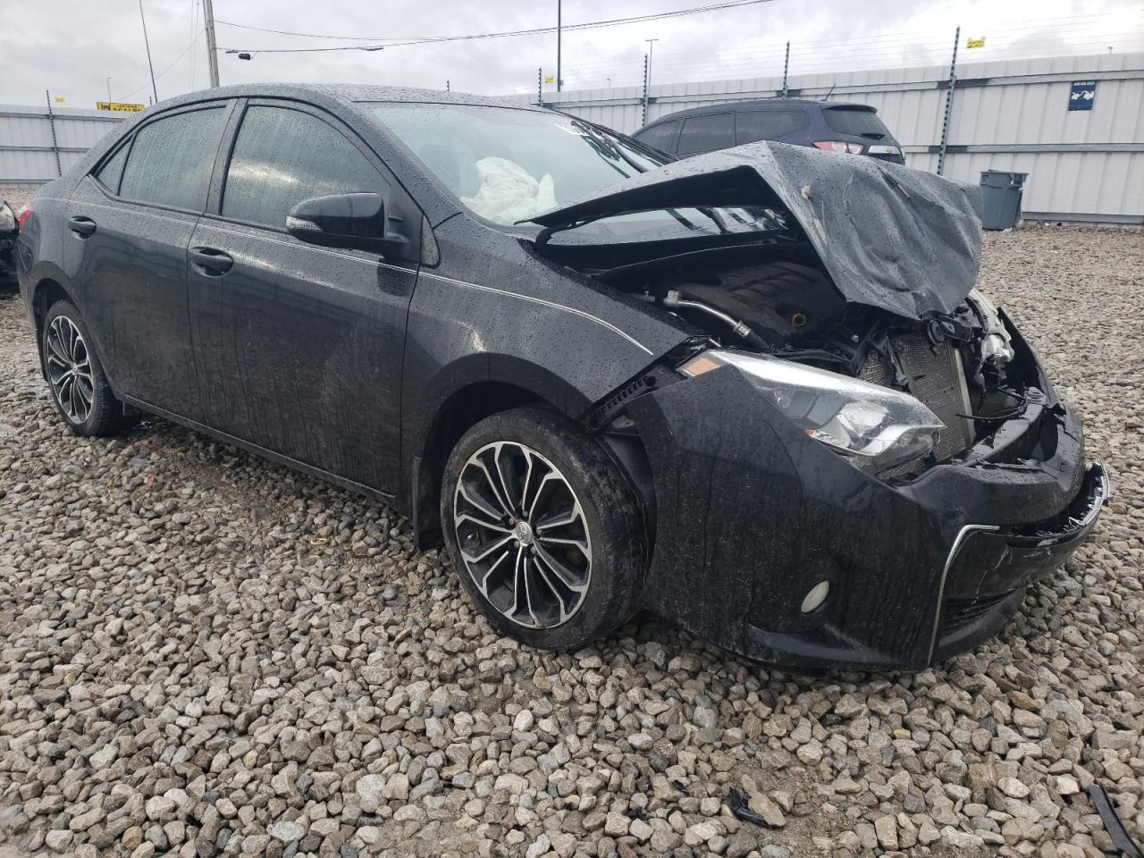 TOYOTA COROLLA L 2014 with VIN 5YFBURHEXEP035207 - Photo from auction