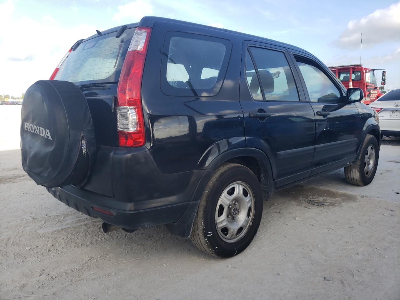 Photo 4 from auction – 2005 HONDA CR-V LX with VIN JHLRD68555C012734