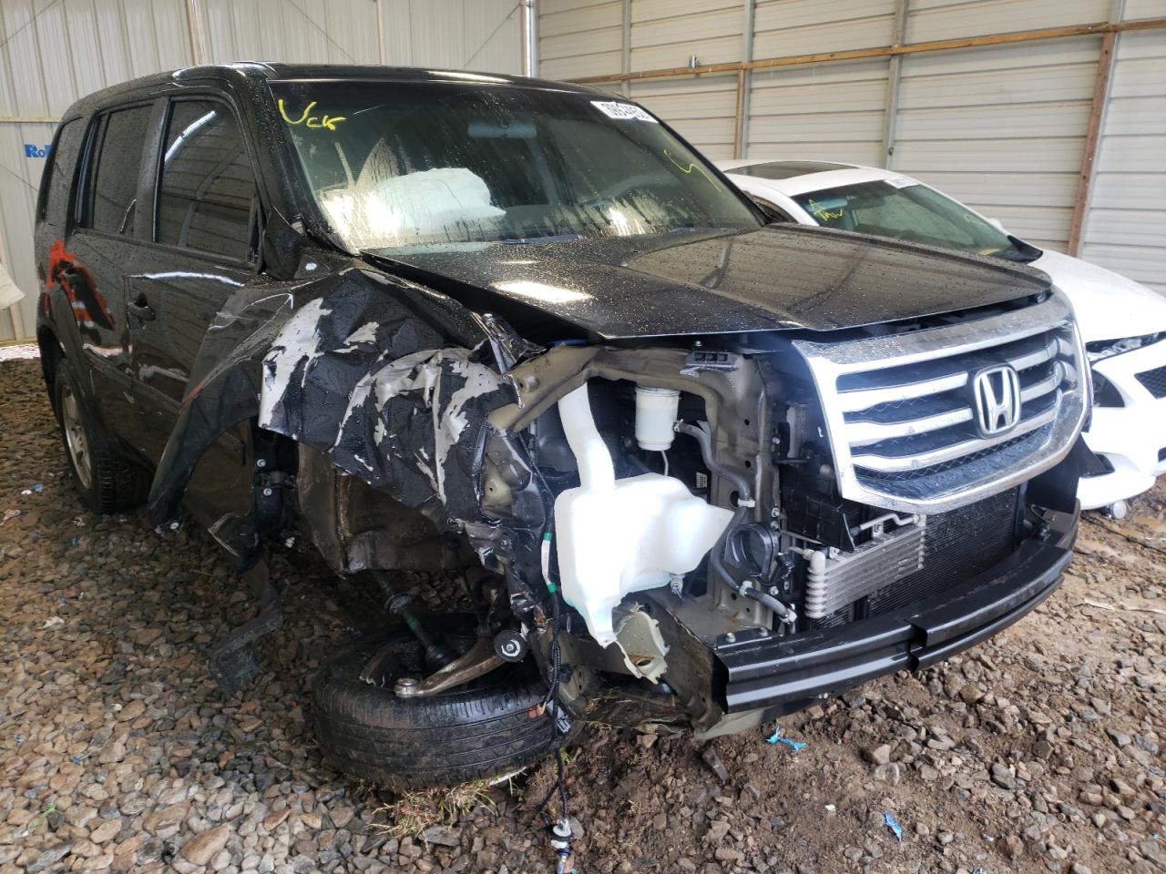 HONDA PILOT LX 2013 with VIN 5FNYF4H27DB051243 - Photo from auction