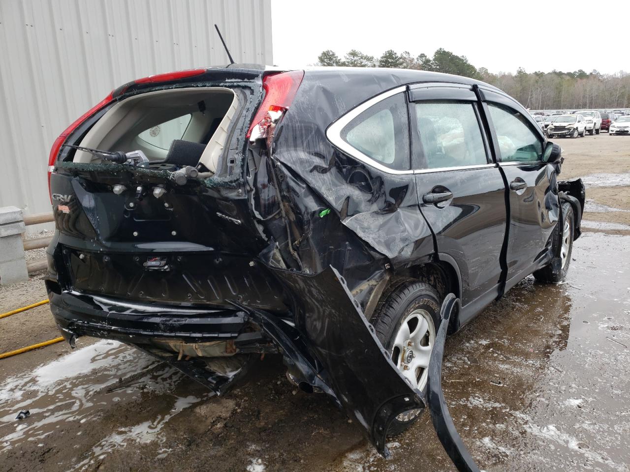 Photo 4 from auction – 2016 HONDA CR-V LX with VIN 5J6RM4H30GL005039