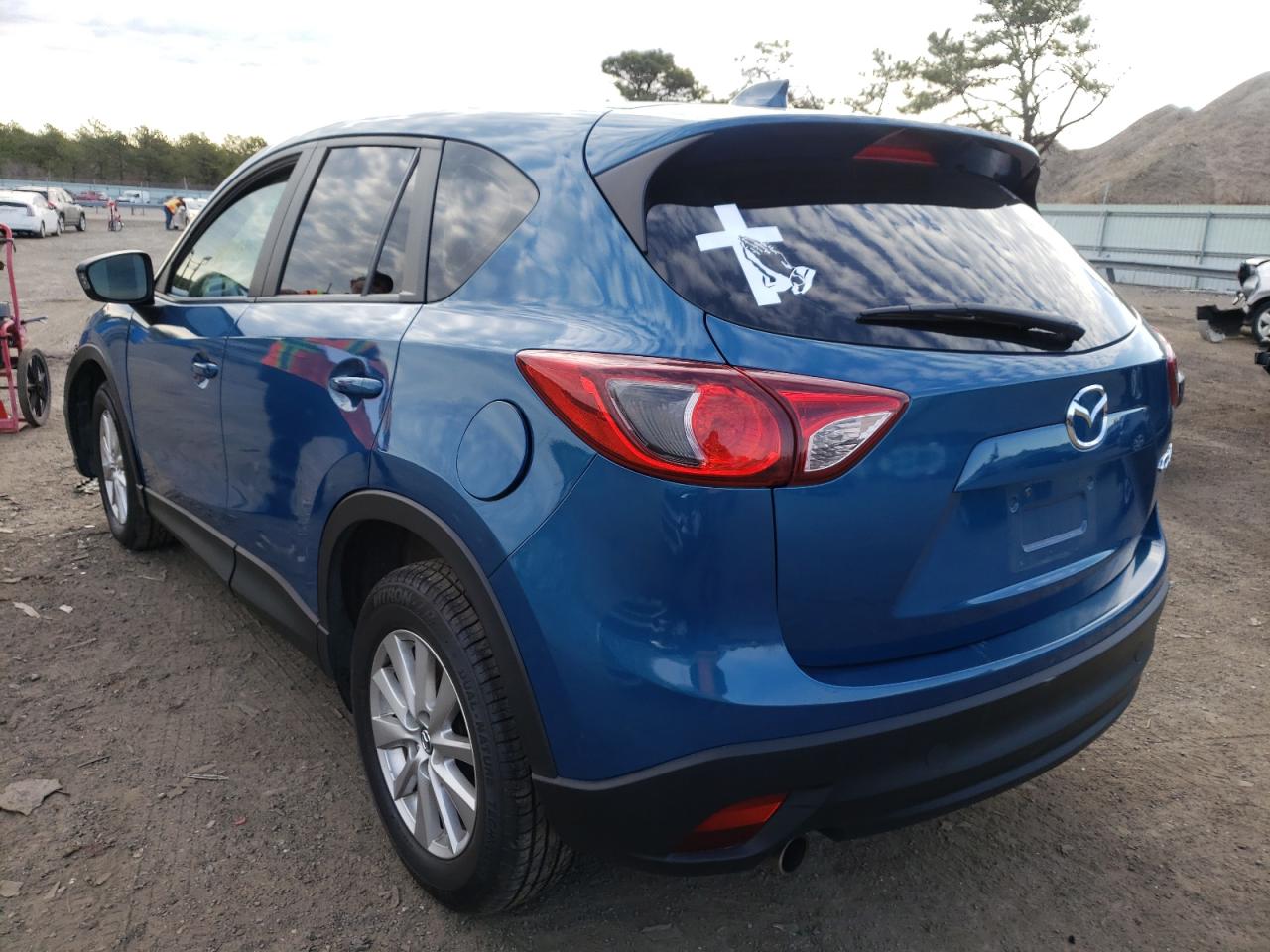 Photo 3 from auction – 2014 MAZDA CX-5 SPORT with VIN JM3KE2BEXE0377738