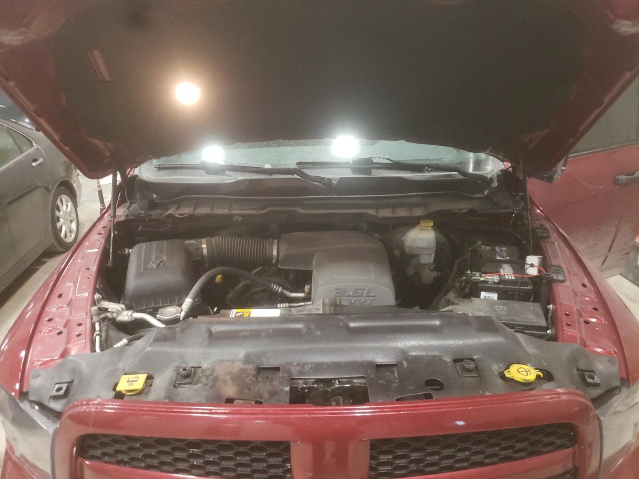 Photo 7 from auction – 2014 RAM 1500 SLT with VIN 1C6RR7GG9ES395632
