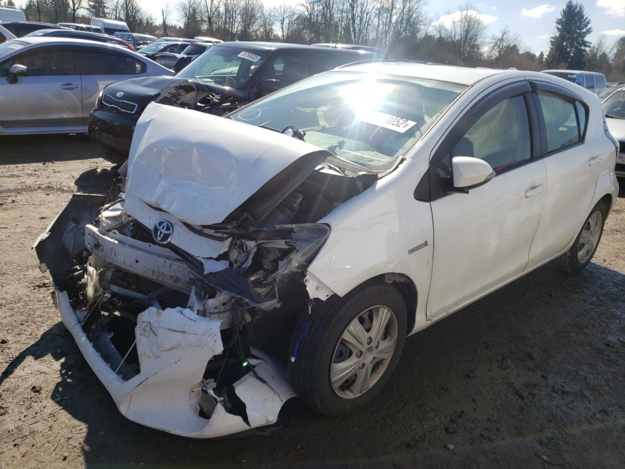 Photo 2 from auction – 2015 TOYOTA PRIUS C with VIN JTDKDTB34F1581706