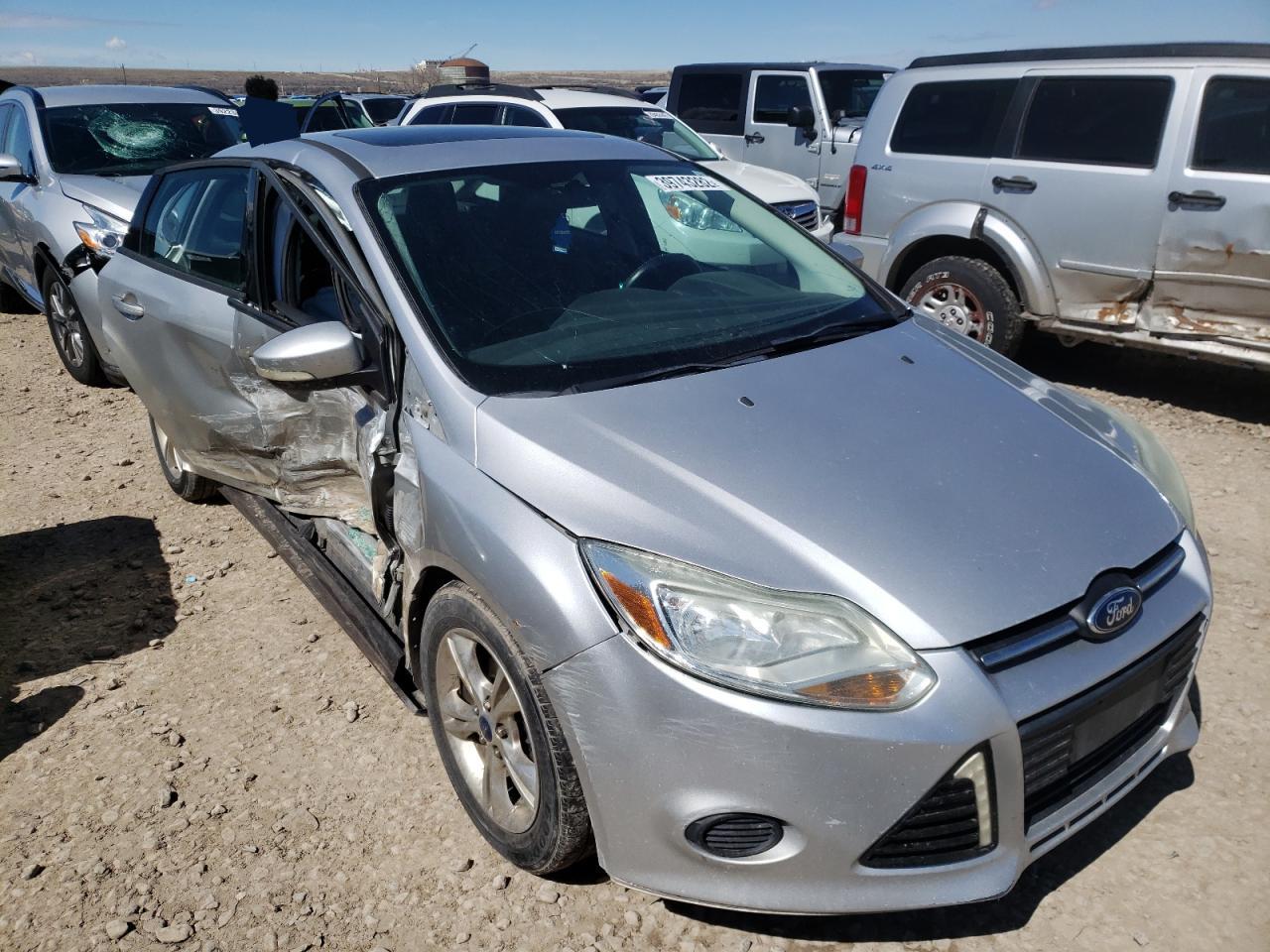 FORD FOCUS SE 2014 with VIN 1FADP3F29EL242272 - Photo from auction