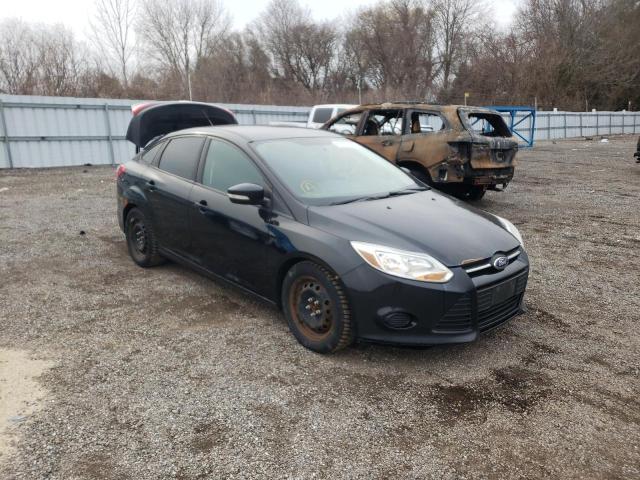 FORD FOCUS SE 2014 with VIN 1FADP3F24EL290701 - Photo from auction
