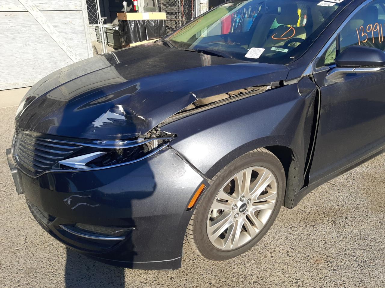 Photo 9 from auction – 2014 LINCOLN MKZ HYBRID with VIN 3LN6L2LU2ER813600
