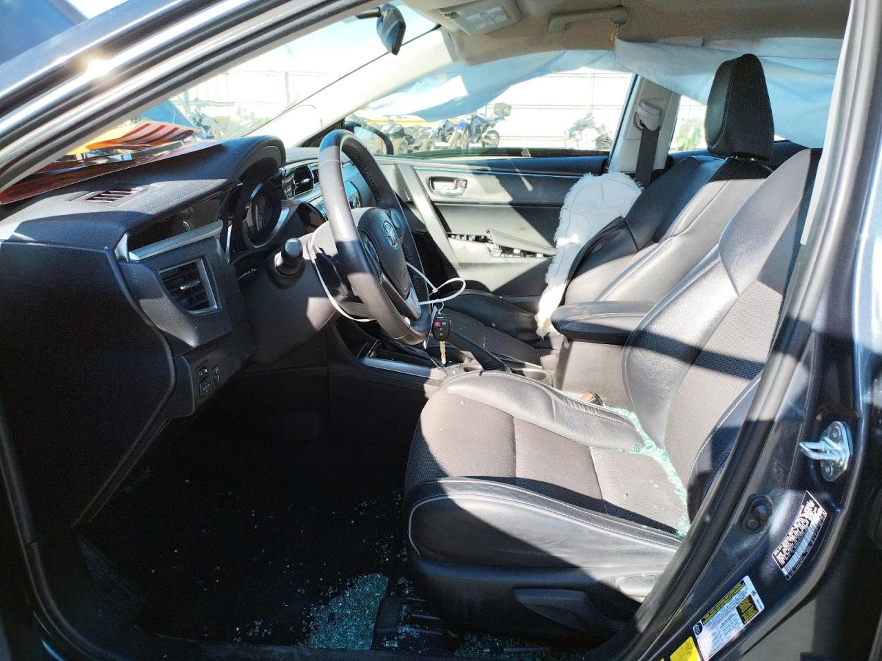 Photo 5 from auction – 2016 TOYOTA COROLLA L with VIN 5YFBURHE5GP557018
