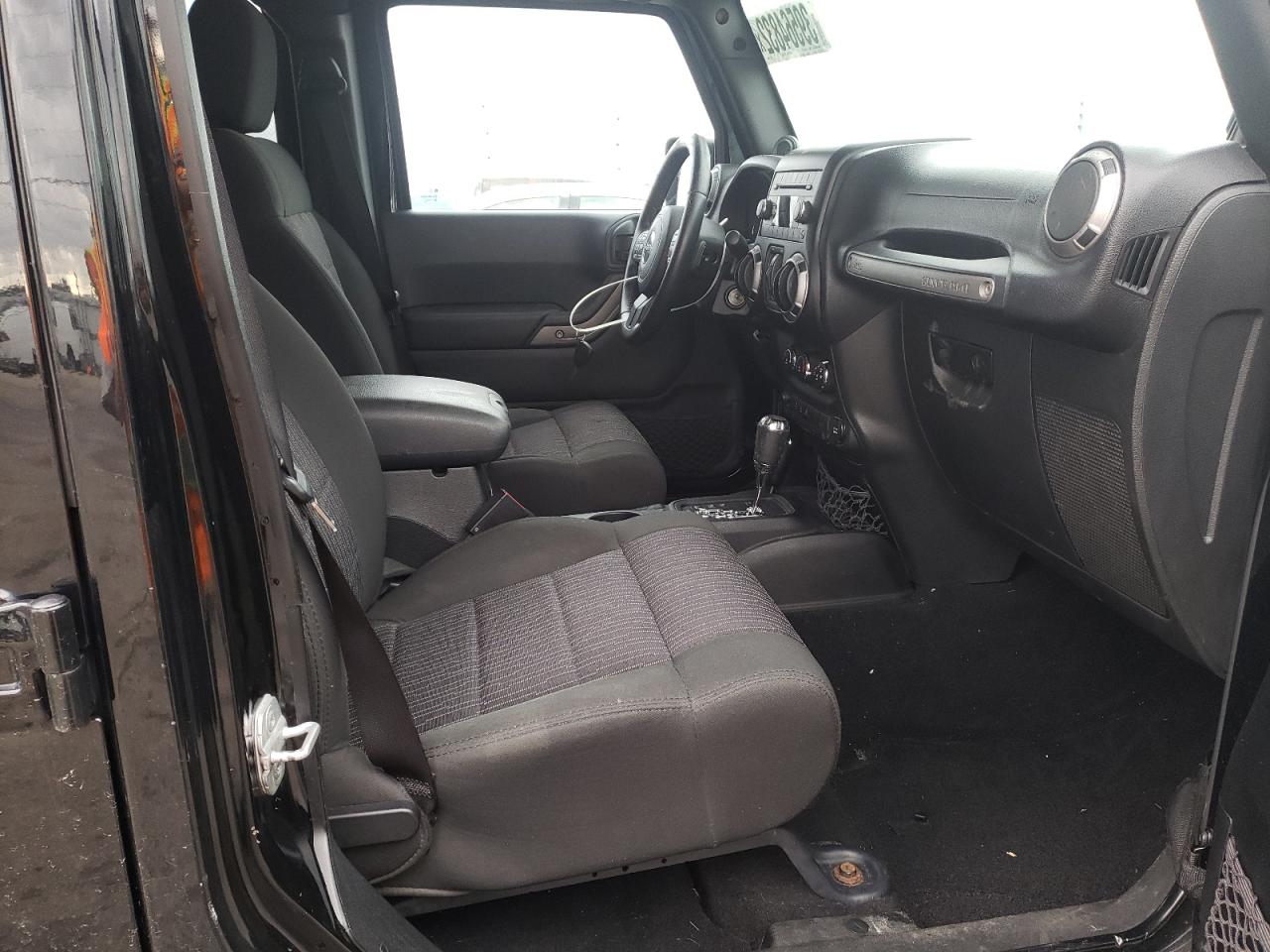 Photo 5 from auction – 2012 JEEP WRANGLER U with VIN 1C4BJWDG5CL245055