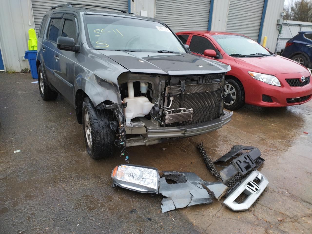 HONDA PILOT EXLN 2011 with VIN 5FNYF3H7XBB026372 - Photo from auction