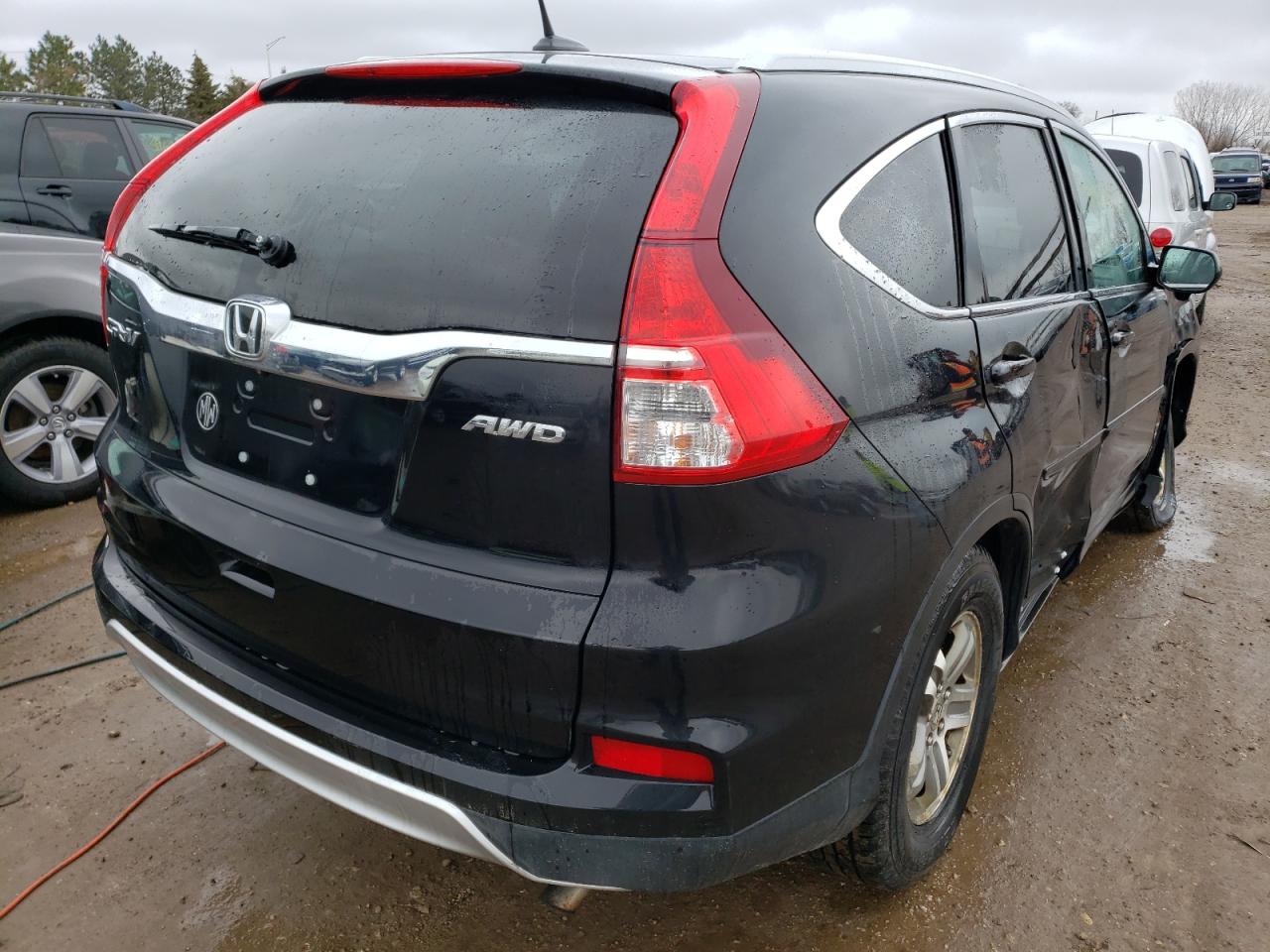 Photo 4 from auction – 2016 HONDA CR-V EXL with VIN 5J6RM4H78GL071986