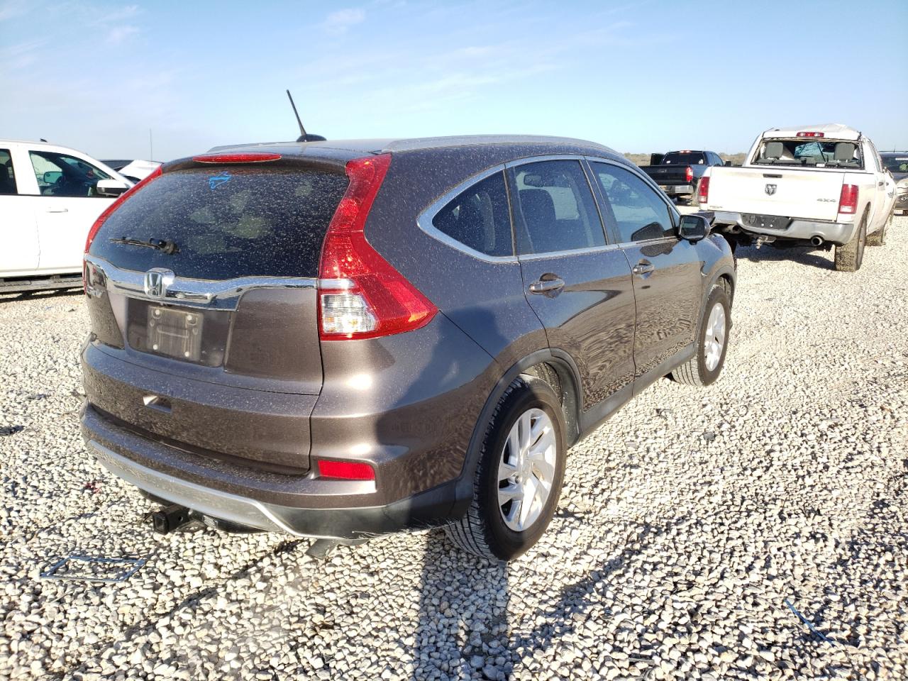 Photo 4 from auction – 2016 HONDA CR-V EXL with VIN 2HKRM3H73GH552328