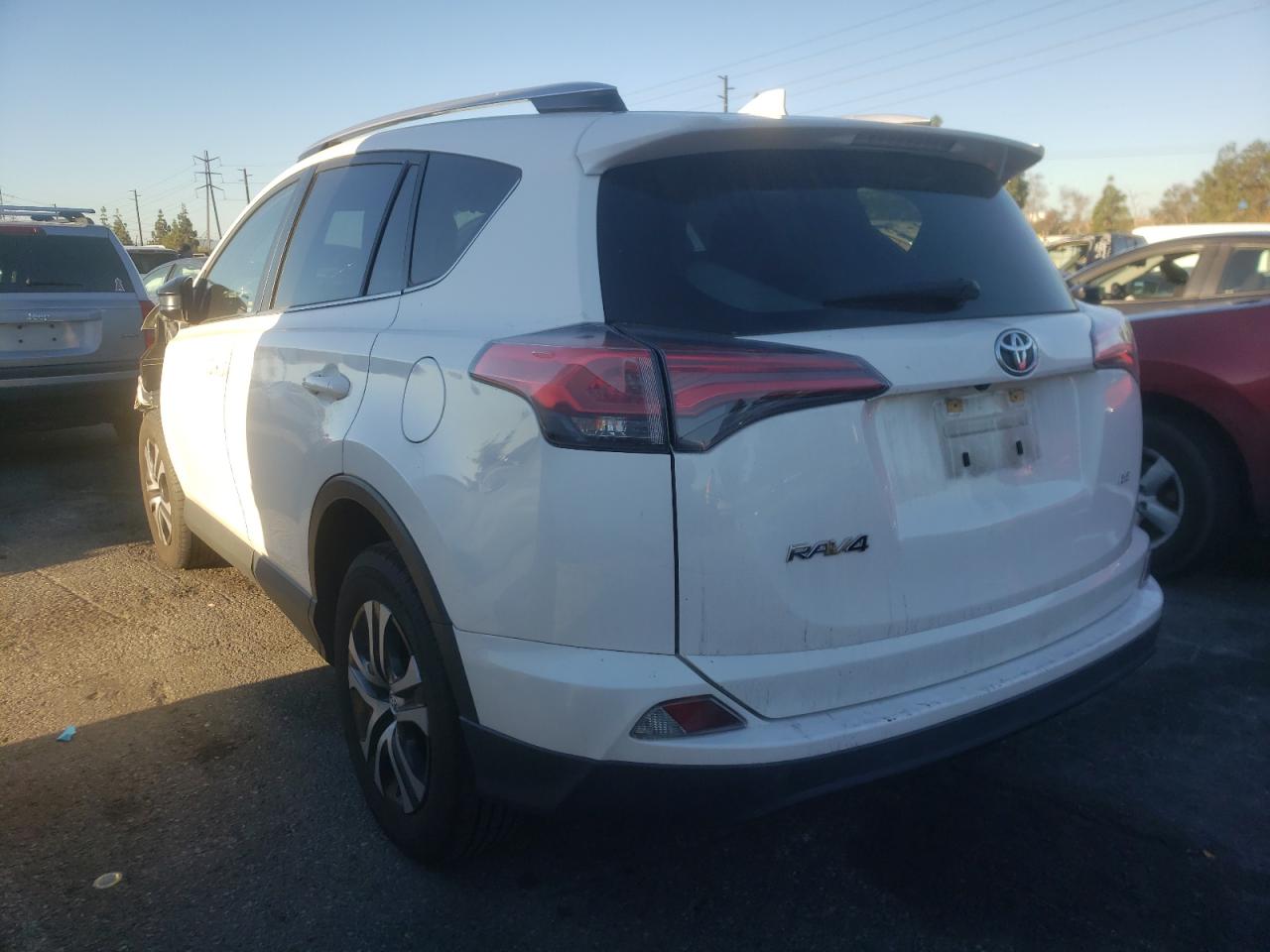Photo 3 from auction – 2016 TOYOTA RAV4 LE with VIN JTMZFREV5GJ080947
