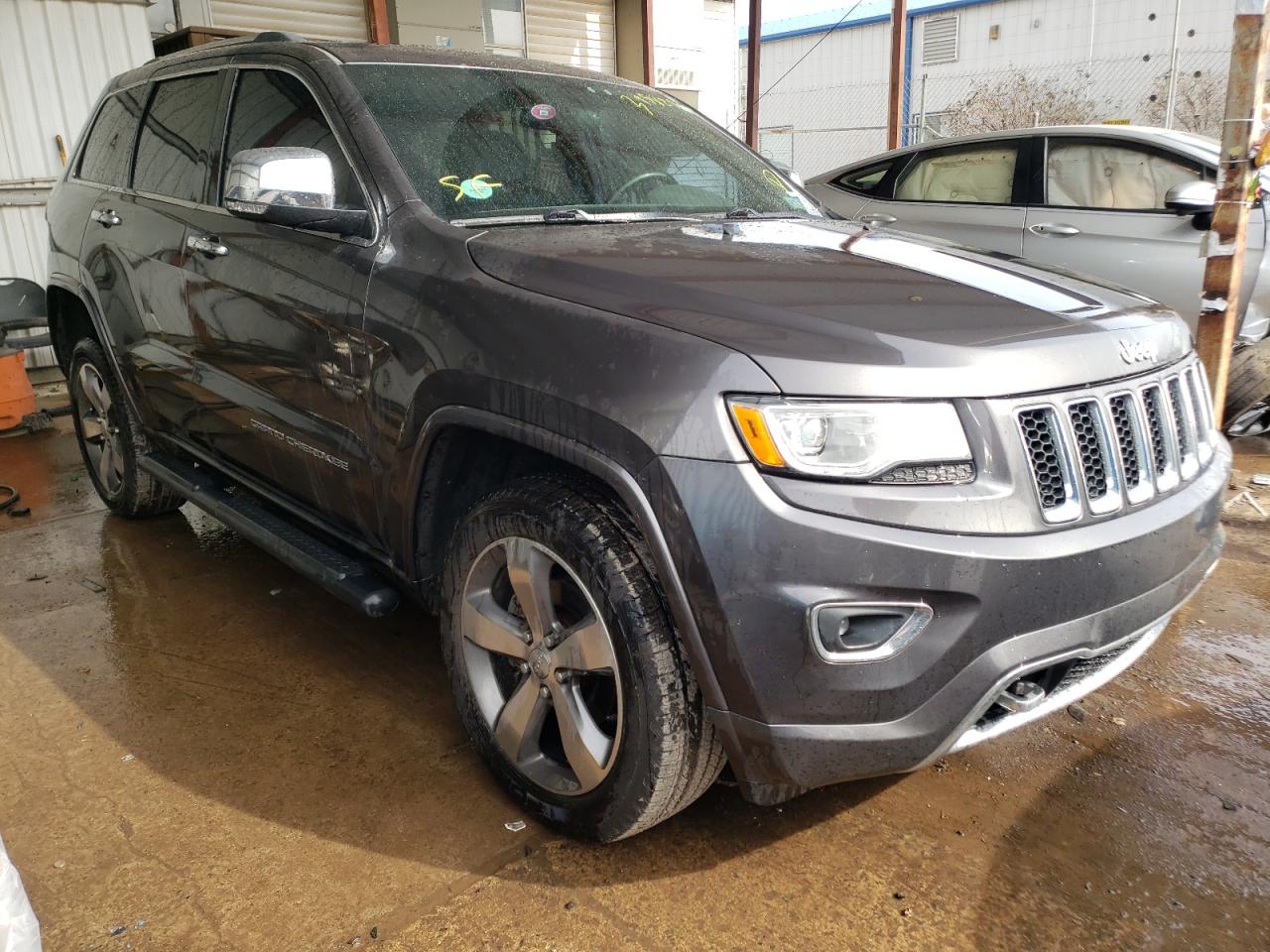 JEEP GRAND CHER 2015 with VIN 1C4RJFCGXFC754384 - Photo from auction