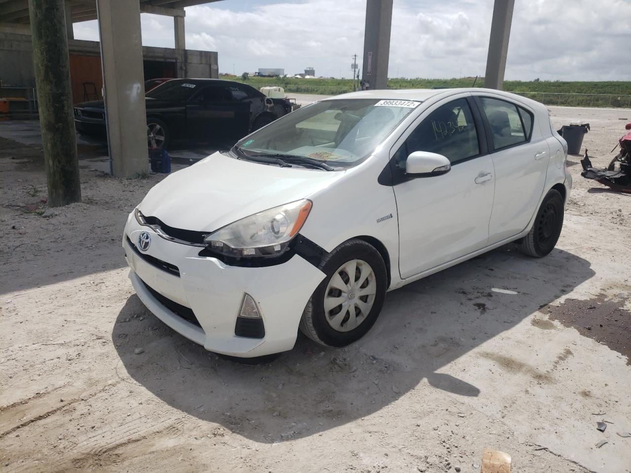 Photo 2 from auction – 2012 TOYOTA PRIUS C with VIN JTDKDTB3XC1507038