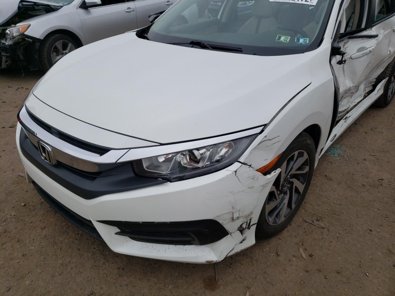 Photo 10 from auction – 2017 HONDA CIVIC EX with VIN 19XFC2F7XHE201778