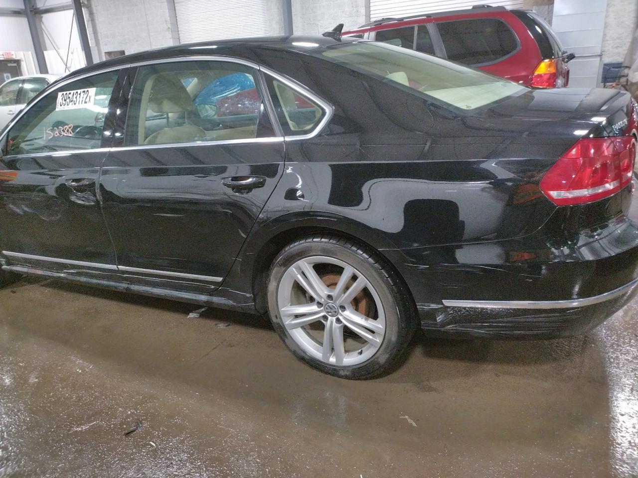 Photo 9 from auction – 2012 VOLKSWAGEN PASSAT SEL with VIN 1VWCN7A38CC037734
