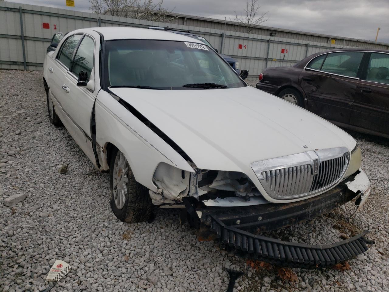 Photo 9 from auction – 2003 LINCOLN TOWN CAR E with VIN 1LNHM81W23Y635361