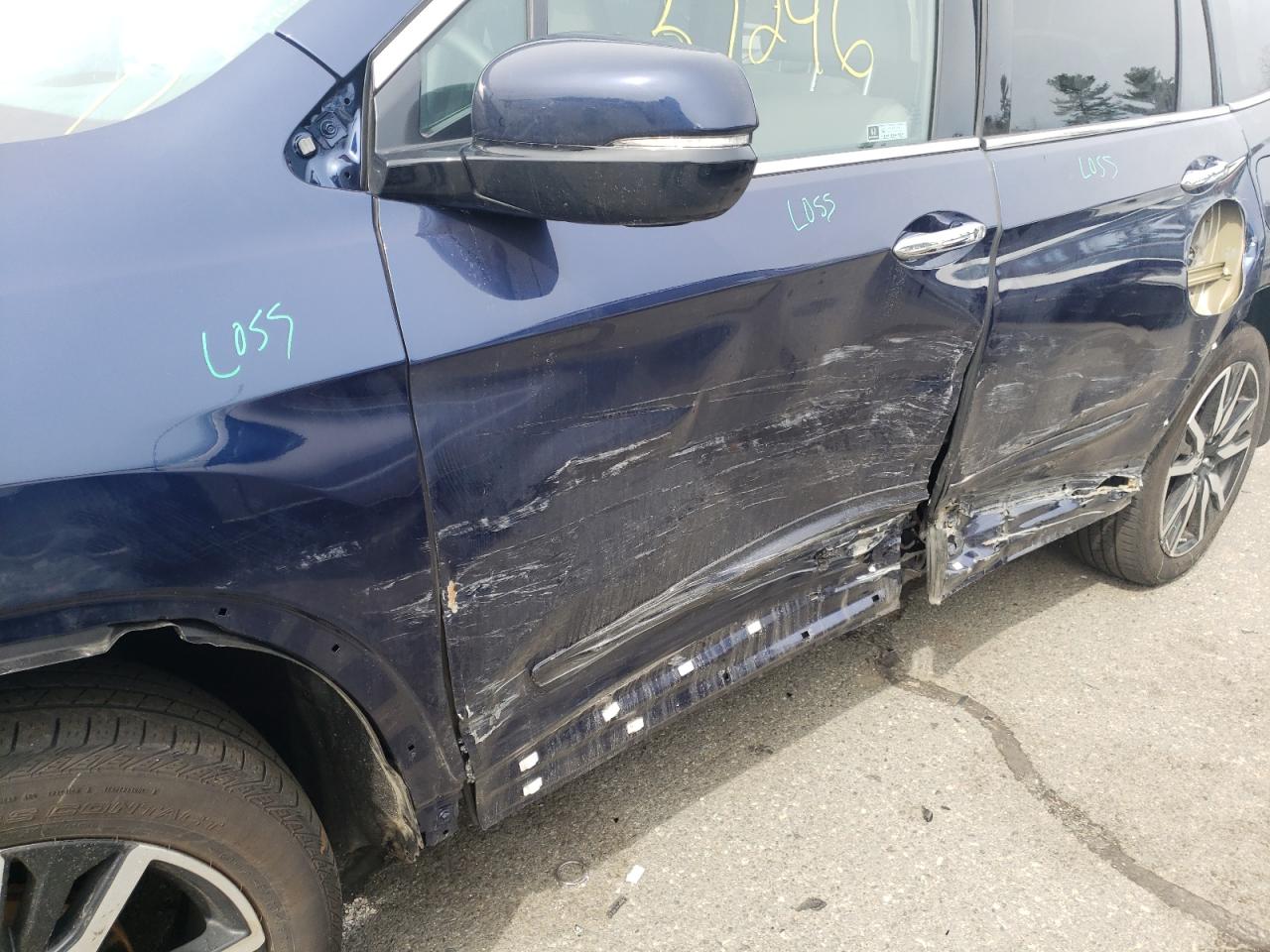 Photo 9 from auction – 2020 HONDA PILOT ELIT with VIN 5FNYF6H0XLB052959