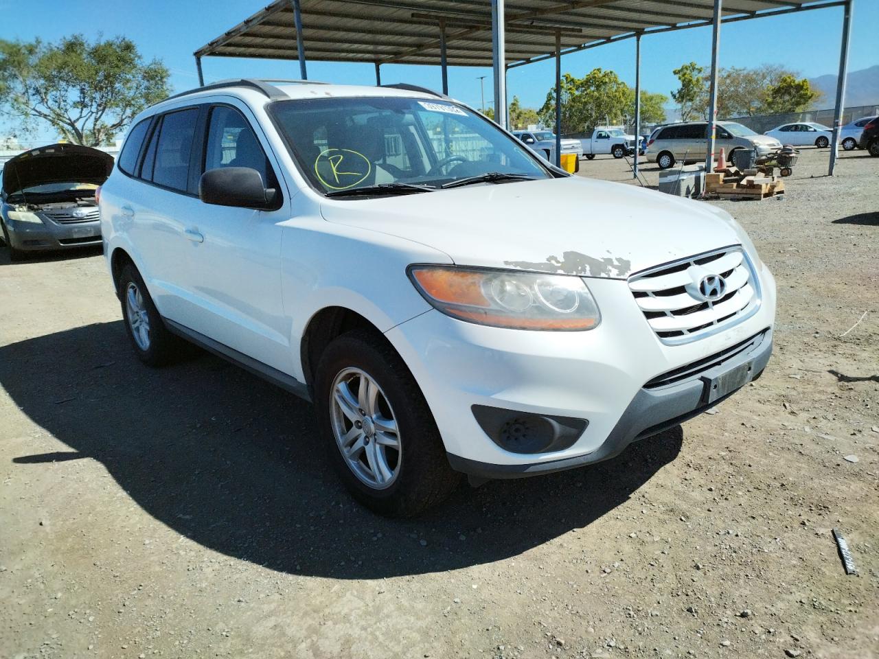HYUNDAI SANTA FE G 2010 with VIN 5NMSG3ABXAH358195 - Photo from auction