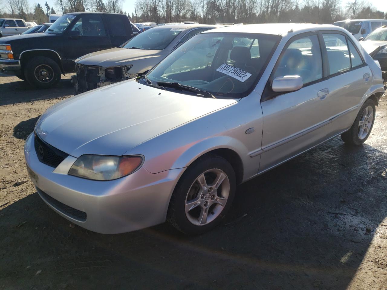 Photo 2 from auction – 2003 MAZDA PROTEGE with VIN JM1BJ225430173731