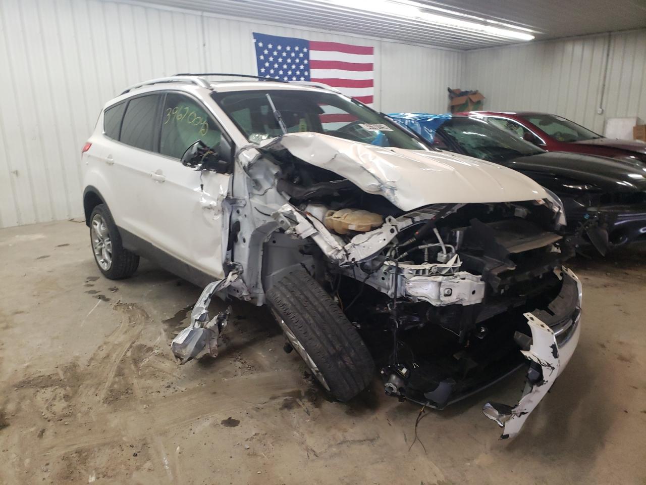 FORD ESCAPE TIT 2013 with VIN 1FMCU9J97DUC67911 - Photo from auction