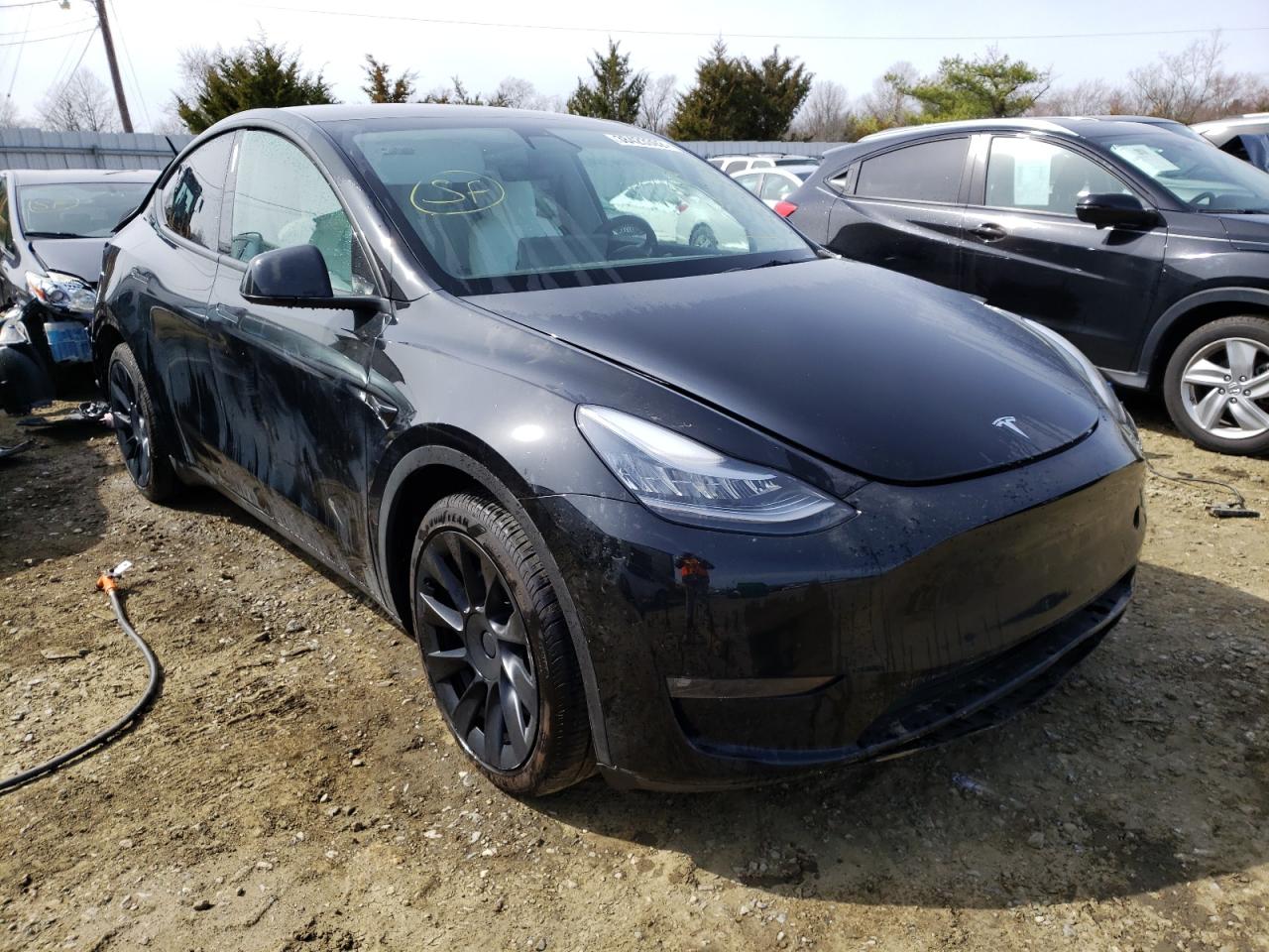 TESLA MODEL Y 2021 with VIN 5YJYGAEE1MF144513 - Photo from auction