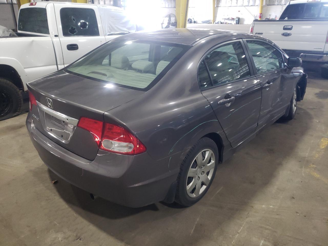 Photo 4 from auction – 2010 HONDA CIVIC LX with VIN 19XFA1F52AE038239