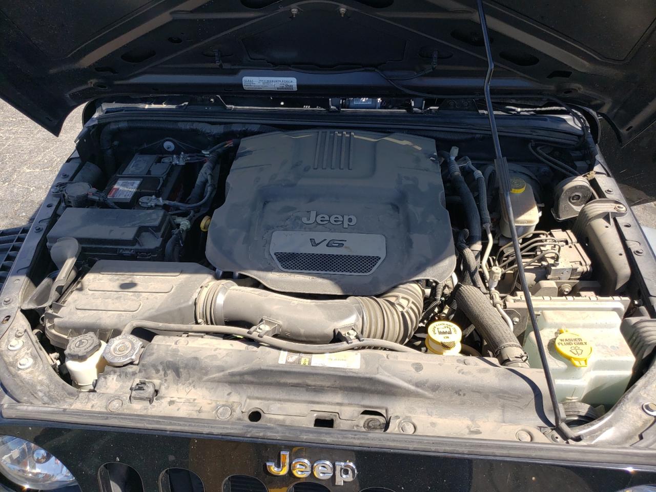 Photo 7 from auction – 2016 JEEP WRANGLER U with VIN 1C4BJWDG0GL323568