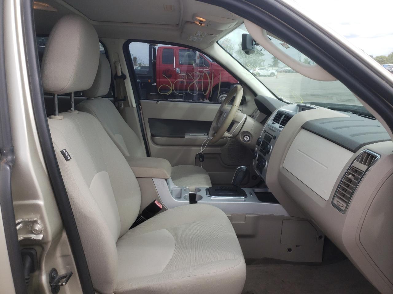 Photo 5 from auction – 2010 MERCURY MARINER with VIN 4M2CN9BG6AKJ12024