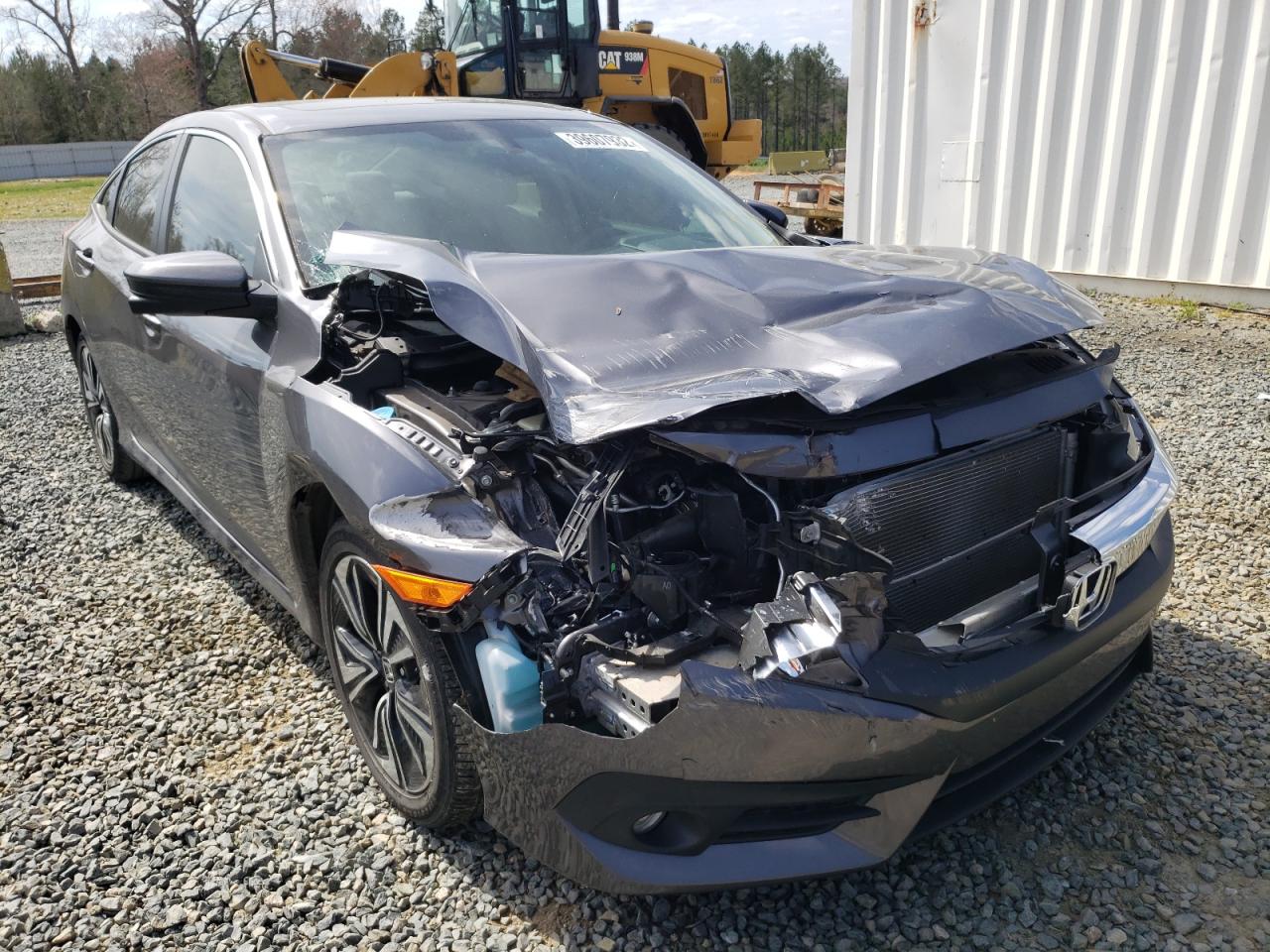 Photo 1 from auction – 2018 HONDA CIVIC EX with VIN JHMFC1F30JX025903