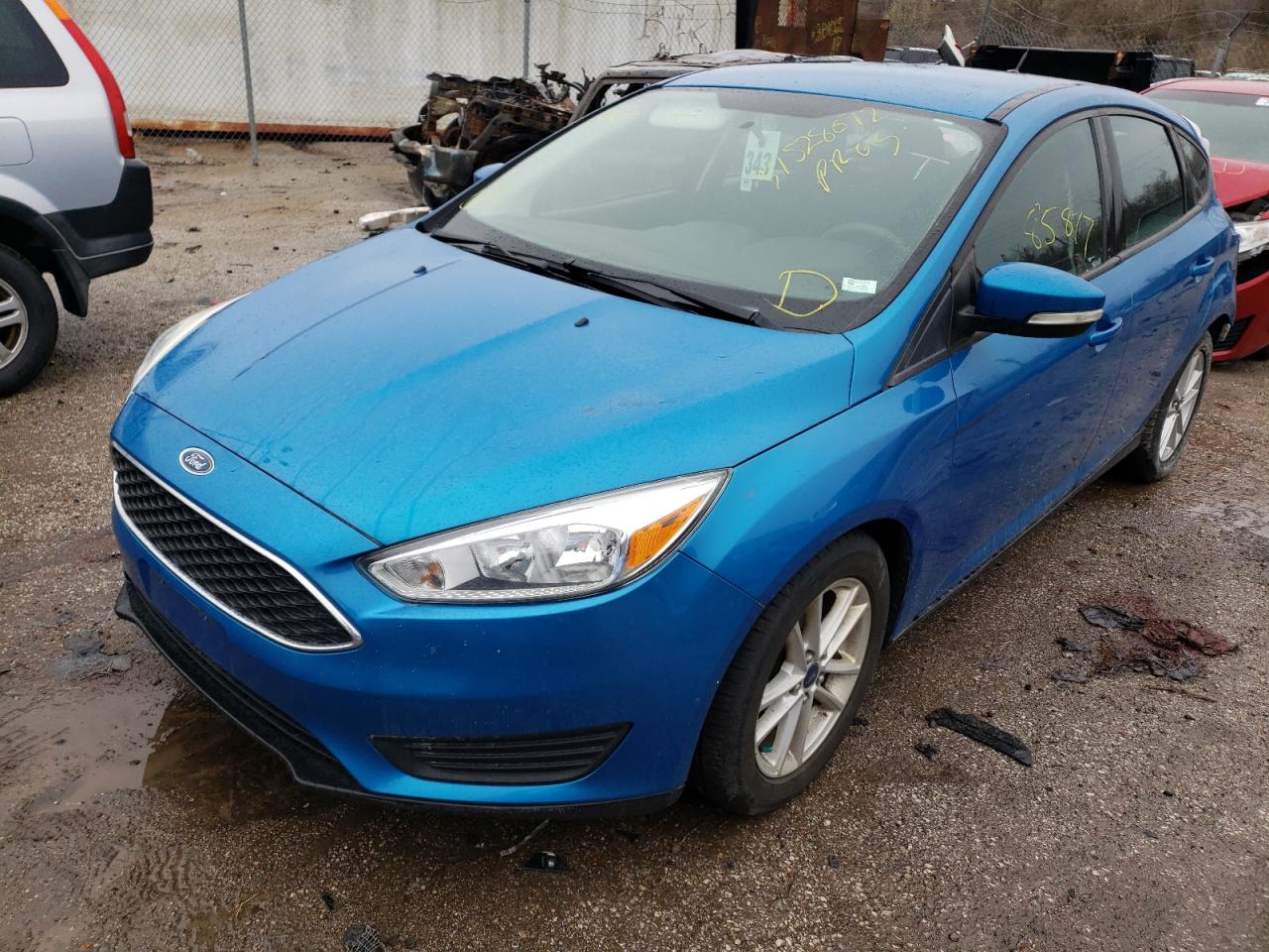 Photo 2 from auction – 2015 FORD FOCUS SE with VIN 1FADP3K21FL223609