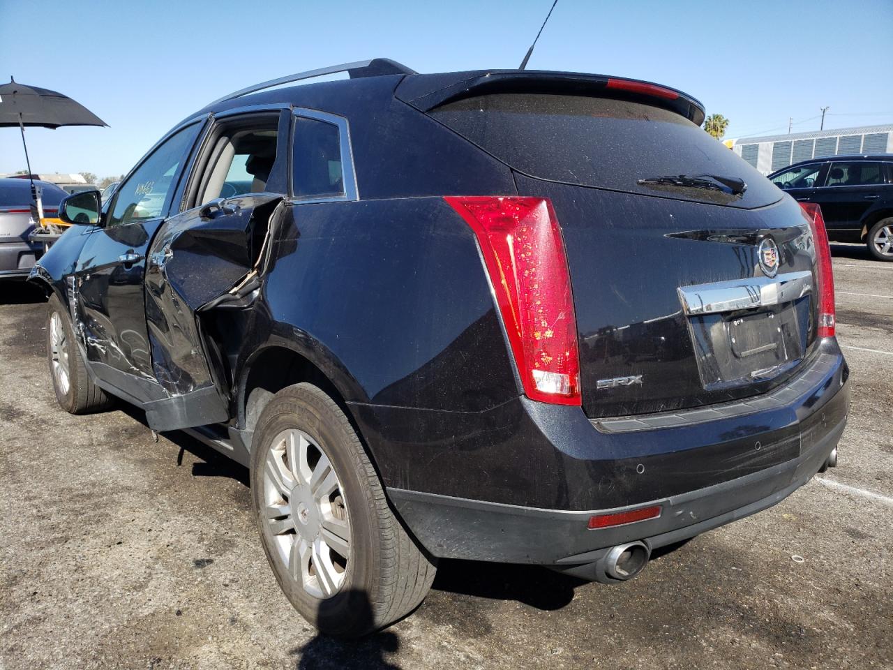 Photo 3 from auction – 2011 CADILLAC SRX LUXURY with VIN 3GYFNAEY8BS678873