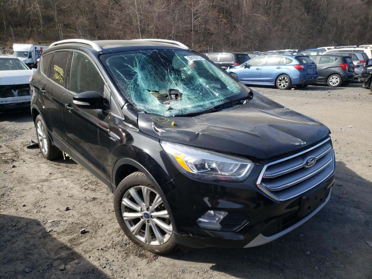 FORD ESCAPE TIT 2017 with VIN 1FMCU9J98HUD02378 - Photo from auction