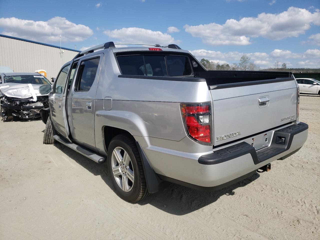 Photo 3 from auction – 2012 HONDA RIDGELINE with VIN 5FPYK1F55CB461195